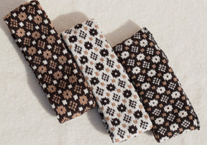 Headbands with 'Crown and the Goose Eye' pattern