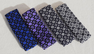 Headbands with 'Crown and the Goose Eye' pattern